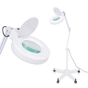Suurendusklaasiga lamp jalaga