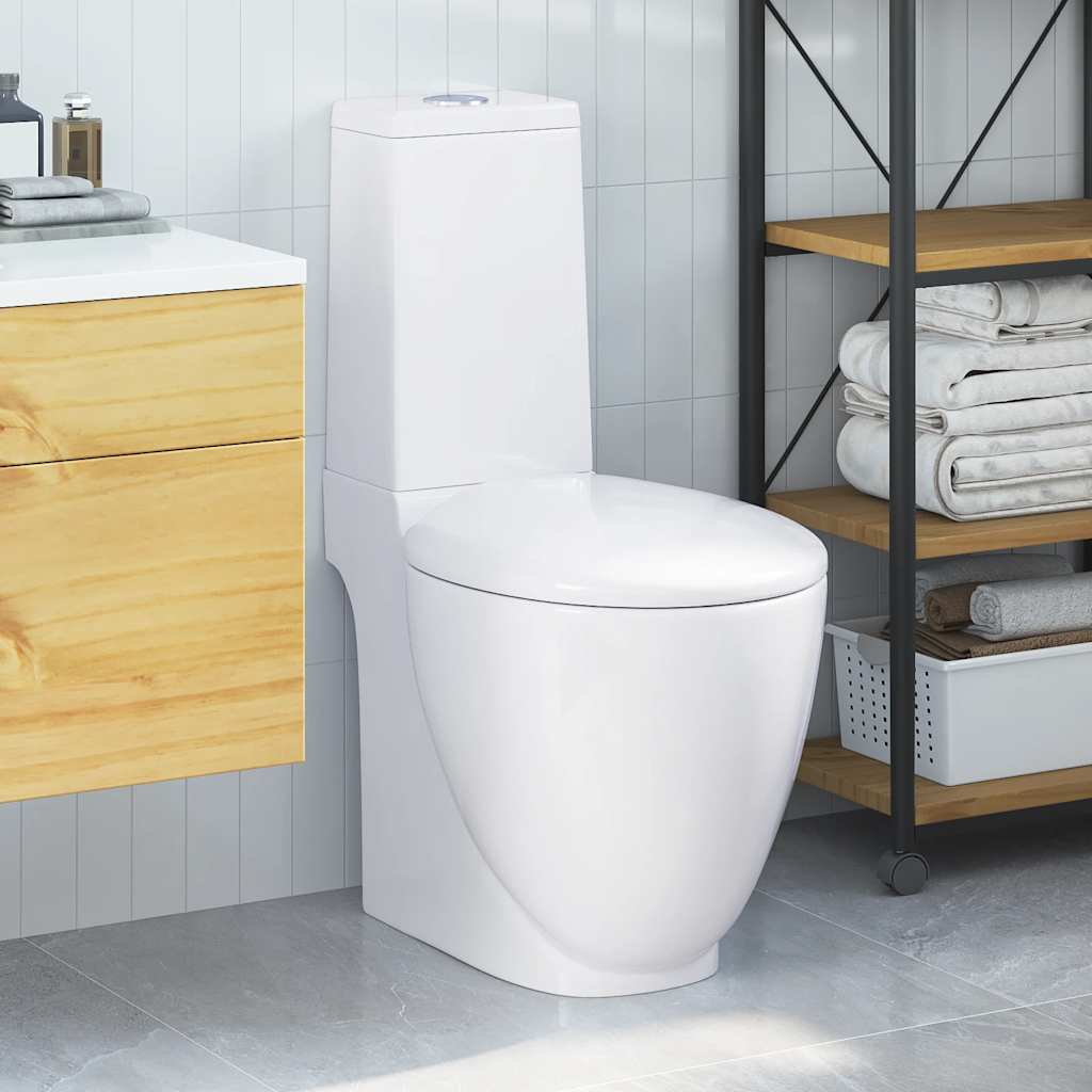 Toilette en céramique écoulement d'eau à l'arrière blanc