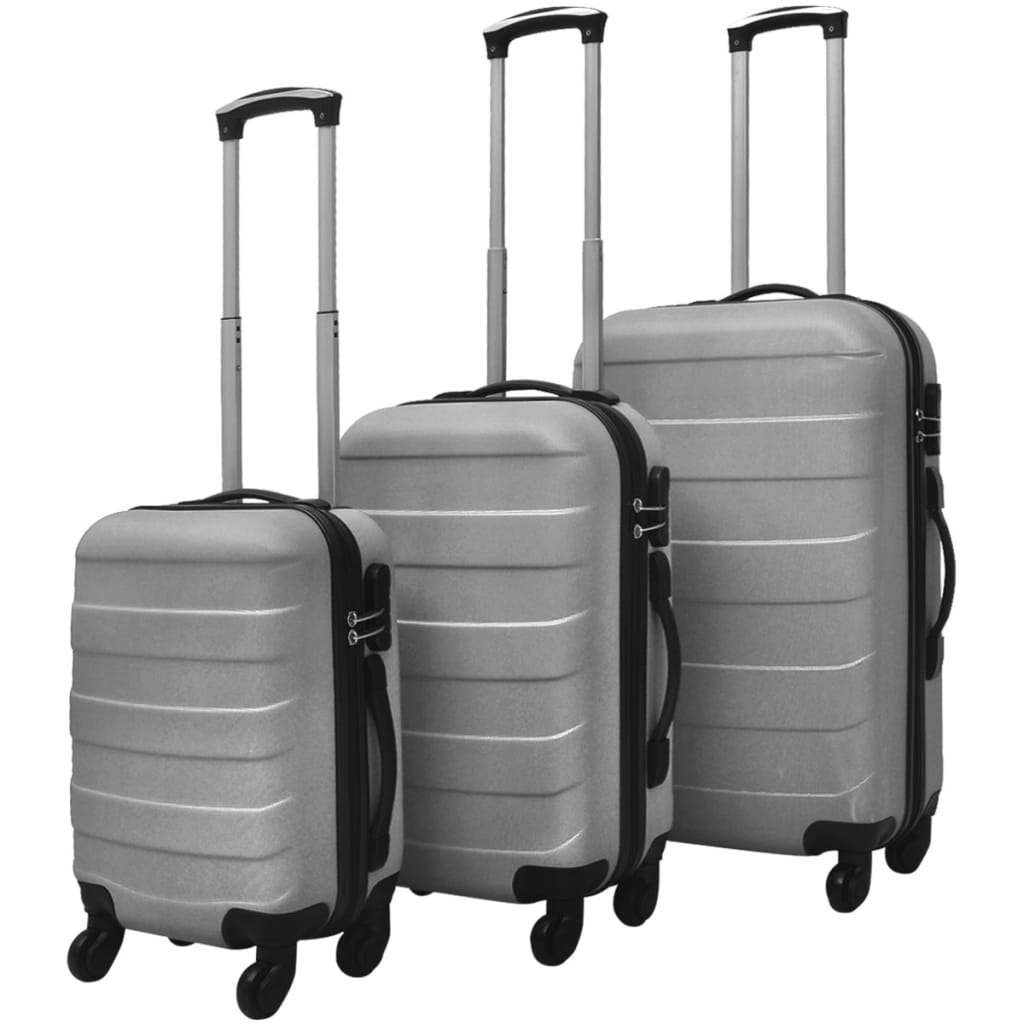 Sada tří skořepinových kufrů na kolečkách, stříbrná