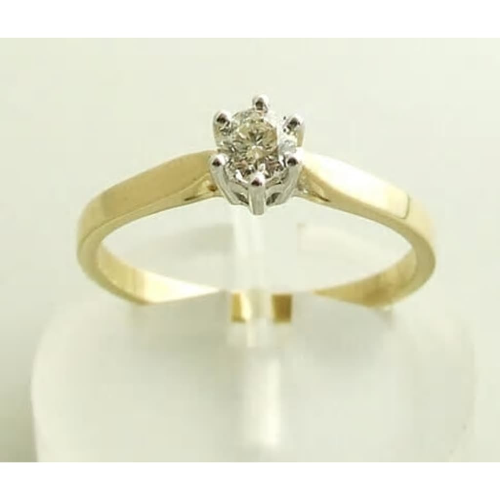 Christian Geel gouden diamanten ring met klauwzetting