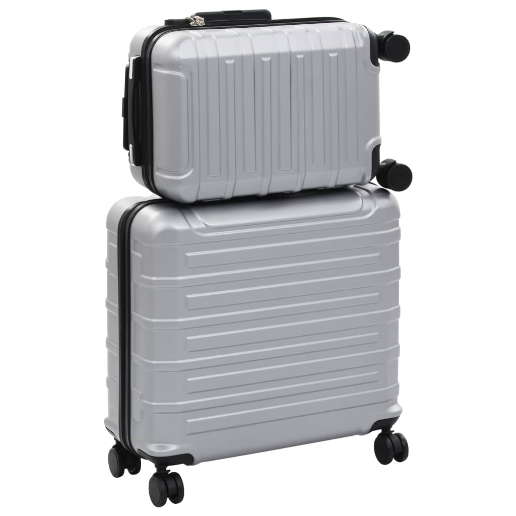 2 db ezüst színű keményfalú ABS gurulós bőrönd 