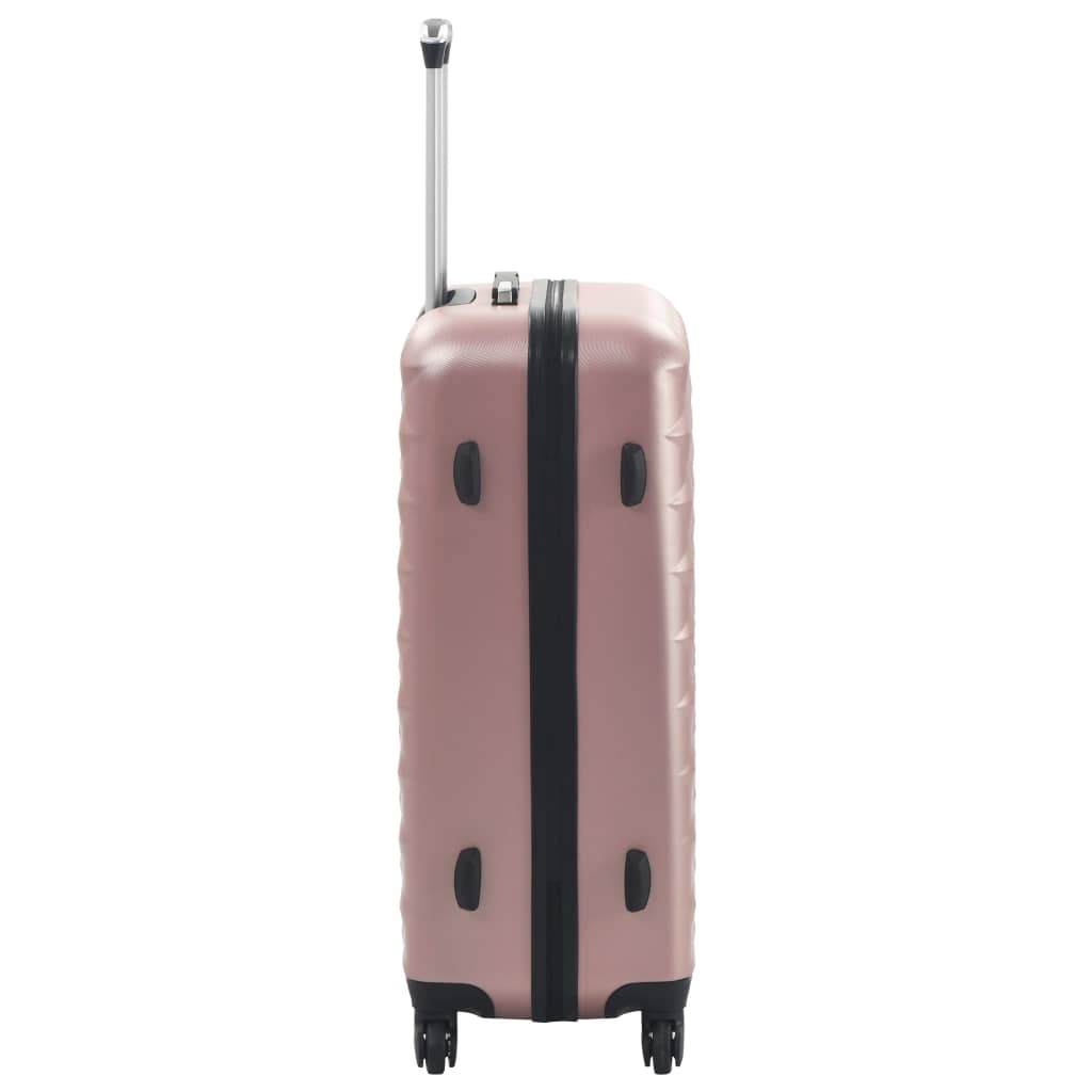 3 db rozéarany színű keményfalú ABS gurulós bőrönd 
