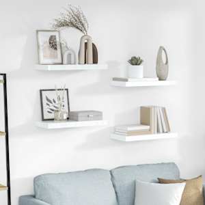 Lebdeče police 4 kosi visok sijaj bele 50x23x3,8 cm MDF