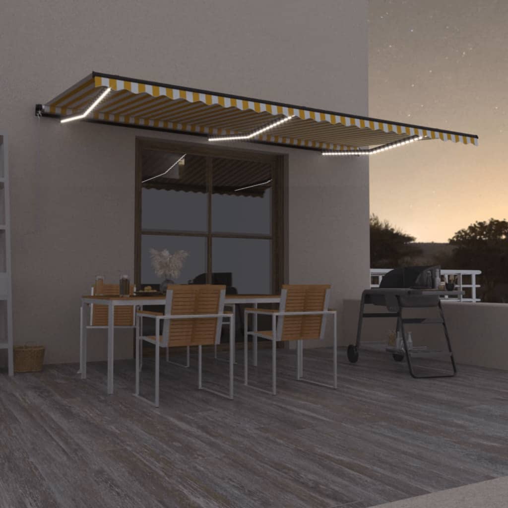 vidaXL Copertină retractabilă manual cu LED, galben și alb, 600x350 cm