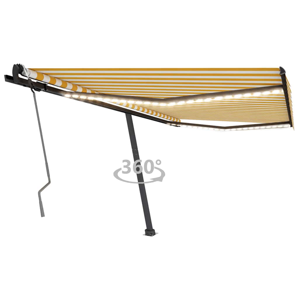vidaXL RuÄŤnÄ› zatahovacĂ­ markĂ˝za s LED svÄ›tlem 450 x 300 cm ĹľlutobĂ­lĂˇ