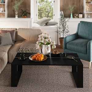 vidaXL طاولة قهوة أسود 110×50×35 سم خشب صناعي