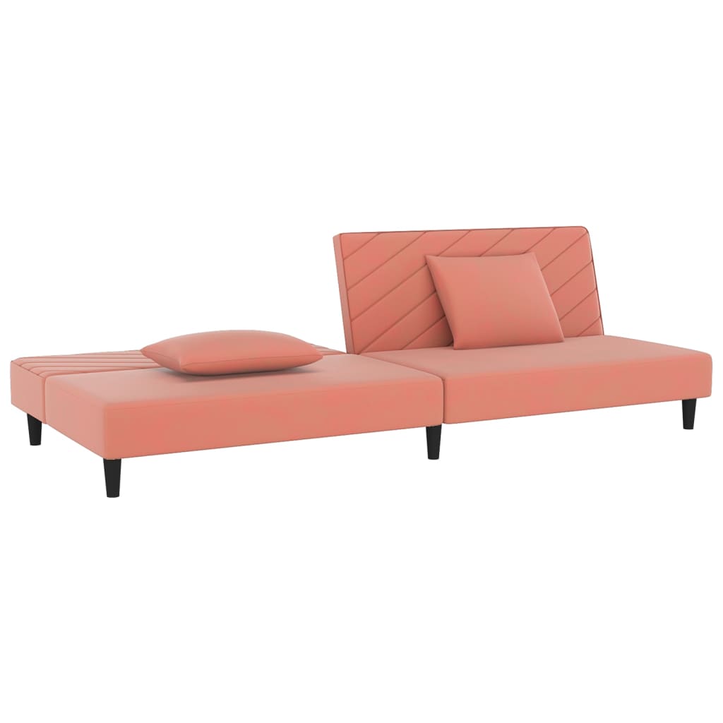 Kétszemélyes rózsaszín bársony kanapéágy két párnával 