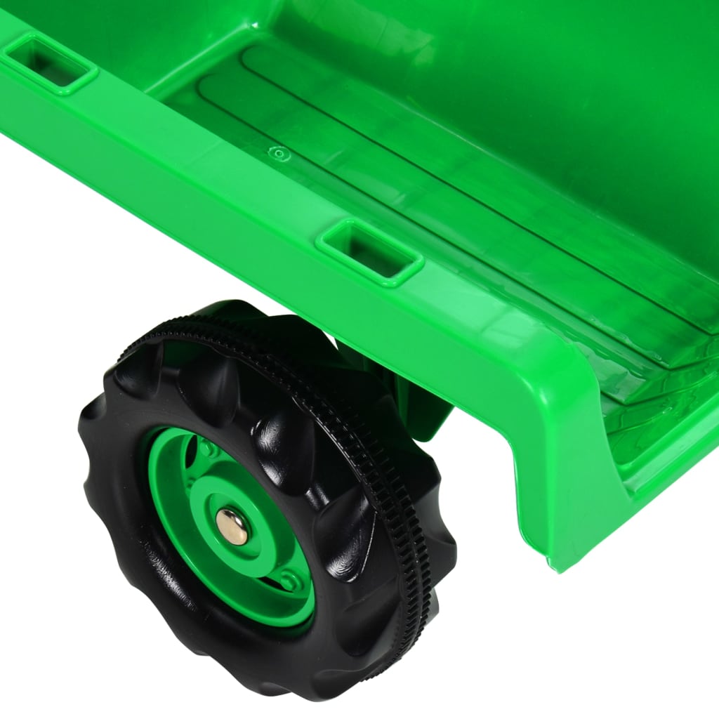 Zöld-fekete pedálos gyerektraktor pótkocsival 