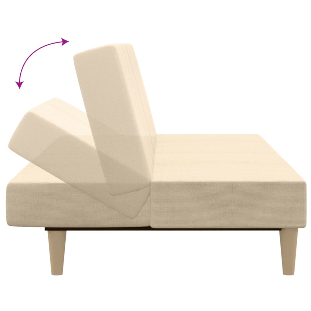 kétszemélyes krémszínű szövet kanapéágy zsámollyal