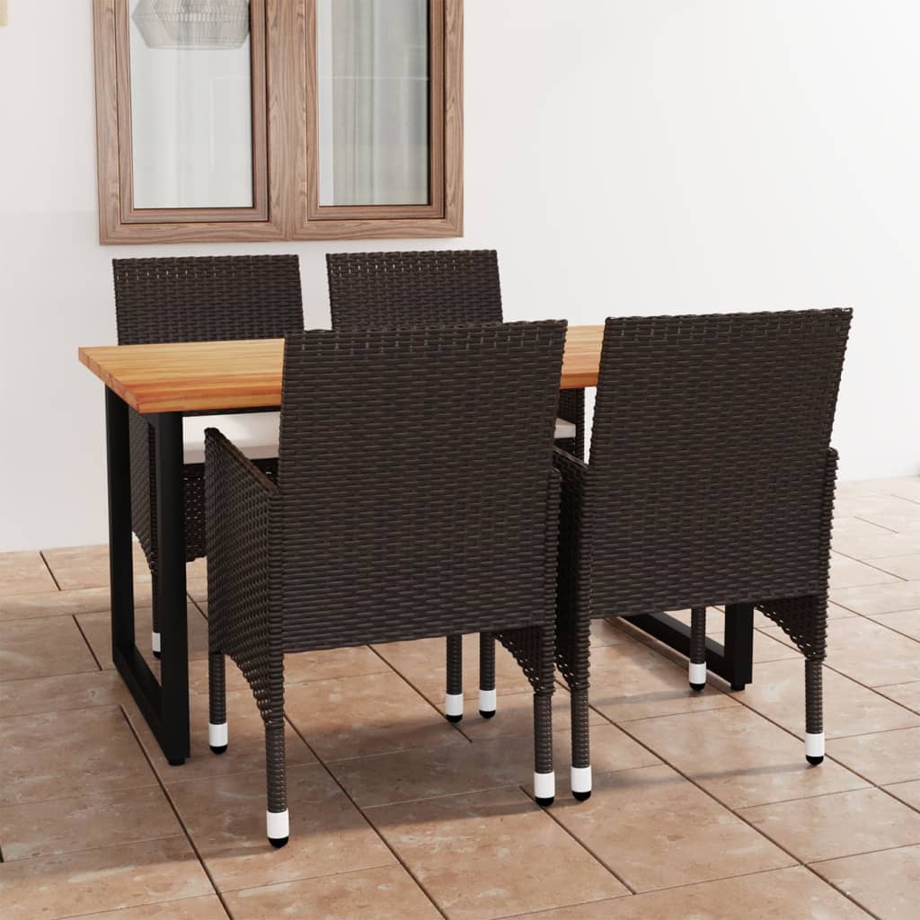 Brown poly rattan and solid wood dining set with four chairs, side view in a room setting.