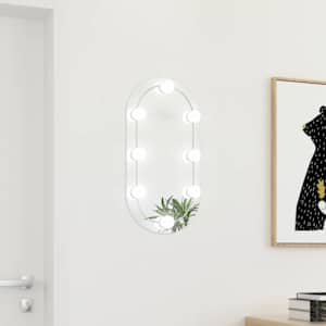 Zrcadlo s LED světly 60 x 30 cm sklo oválné - obrázek 1