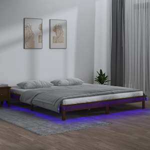 Rám postele s LED světlem medově hnědý 140x190 cm masivní dřevo - obrázek 1