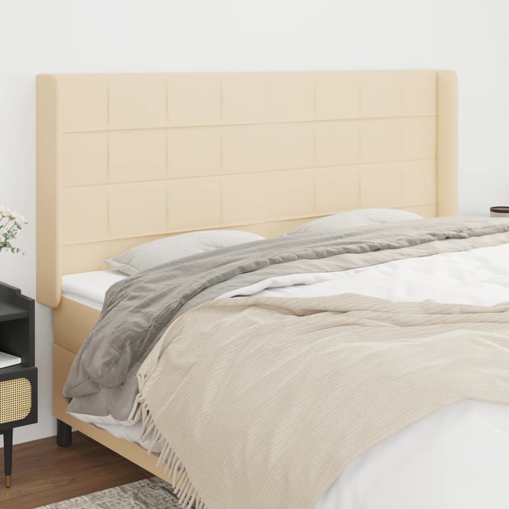 vidaXL sengegavl med kanter 183x16x118/128 cm stof cremefarvet