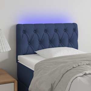 Čelo postele s LED modré 80 x 7 x 78/88 cm textil - obrázek 1