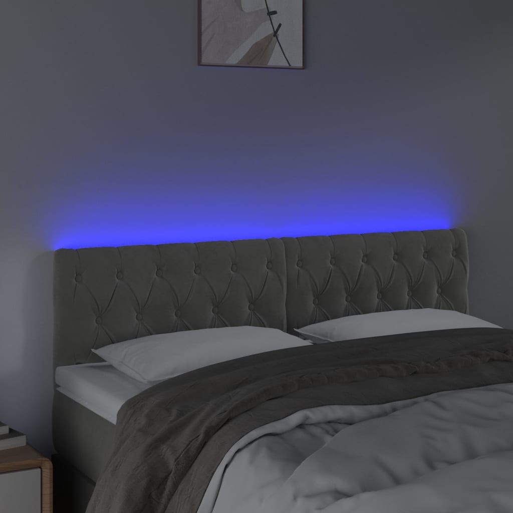  Čelo postele s LED bledosivé 144x7x78/88 cm zamat