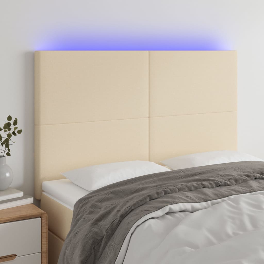 Čelo postele s LED krémové 144x5x118/128 cm textil