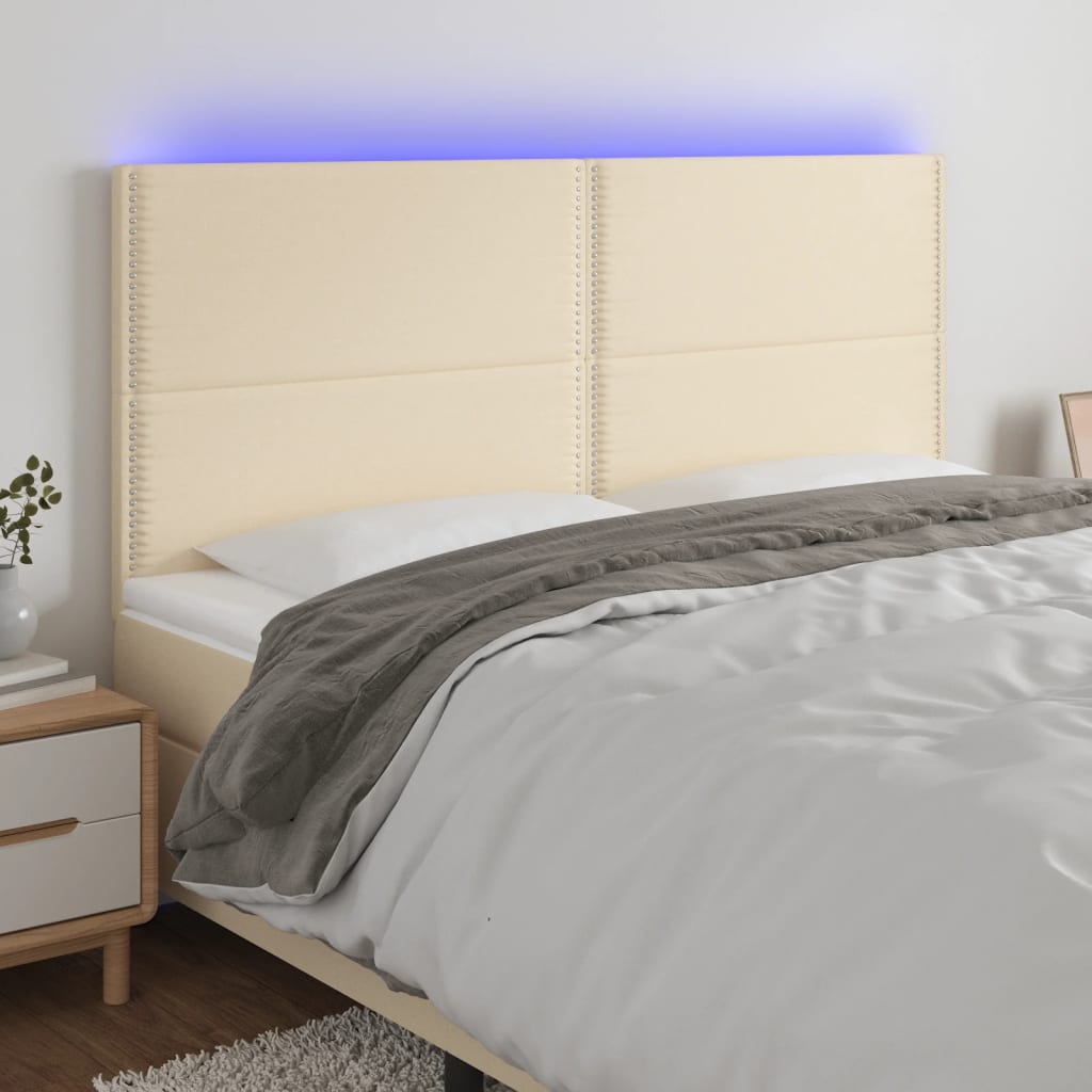 Čelo postele s LED krémové 180x5x118/128 cm textil