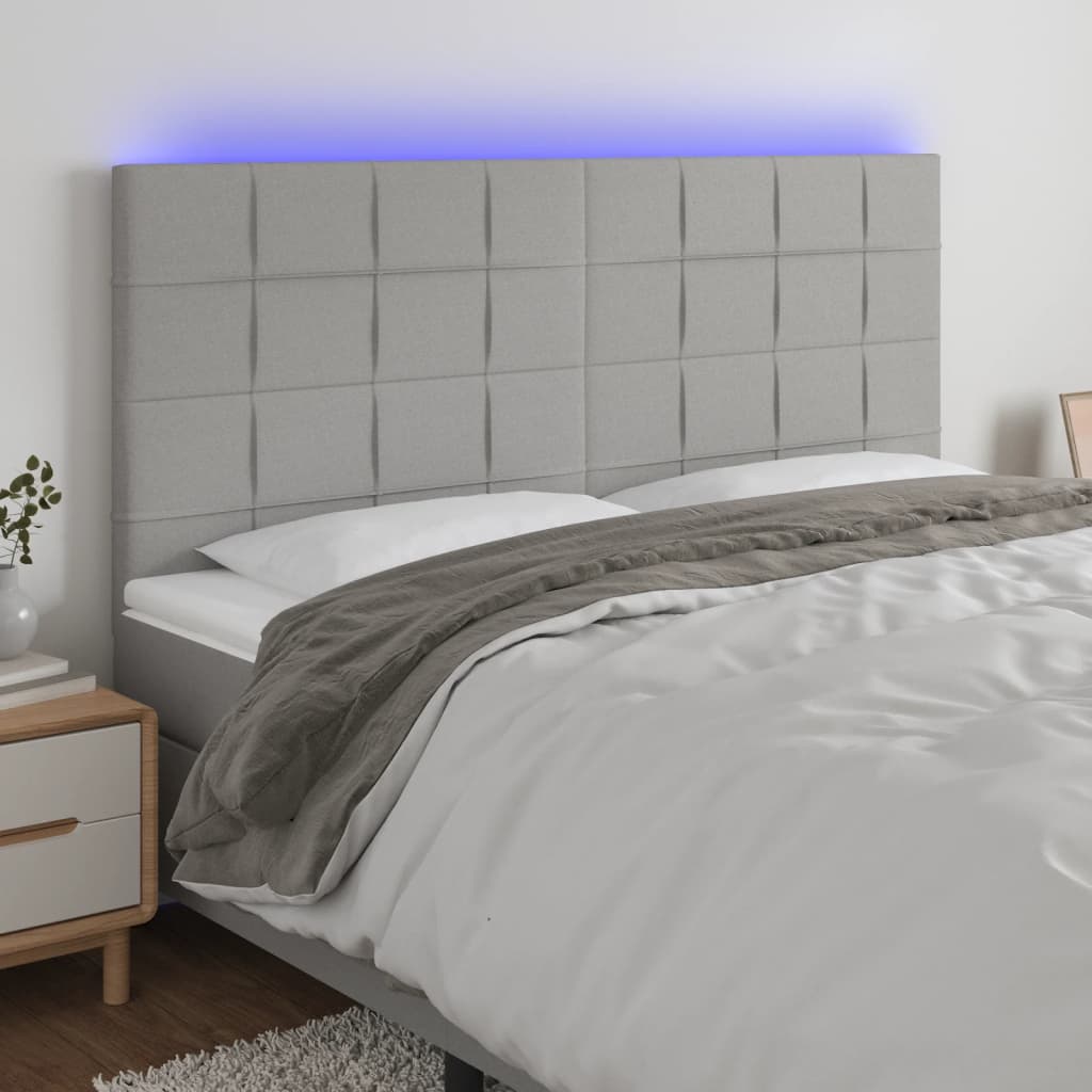 Čelo postele s LED světle šedé 200x5x118/128 cm textil