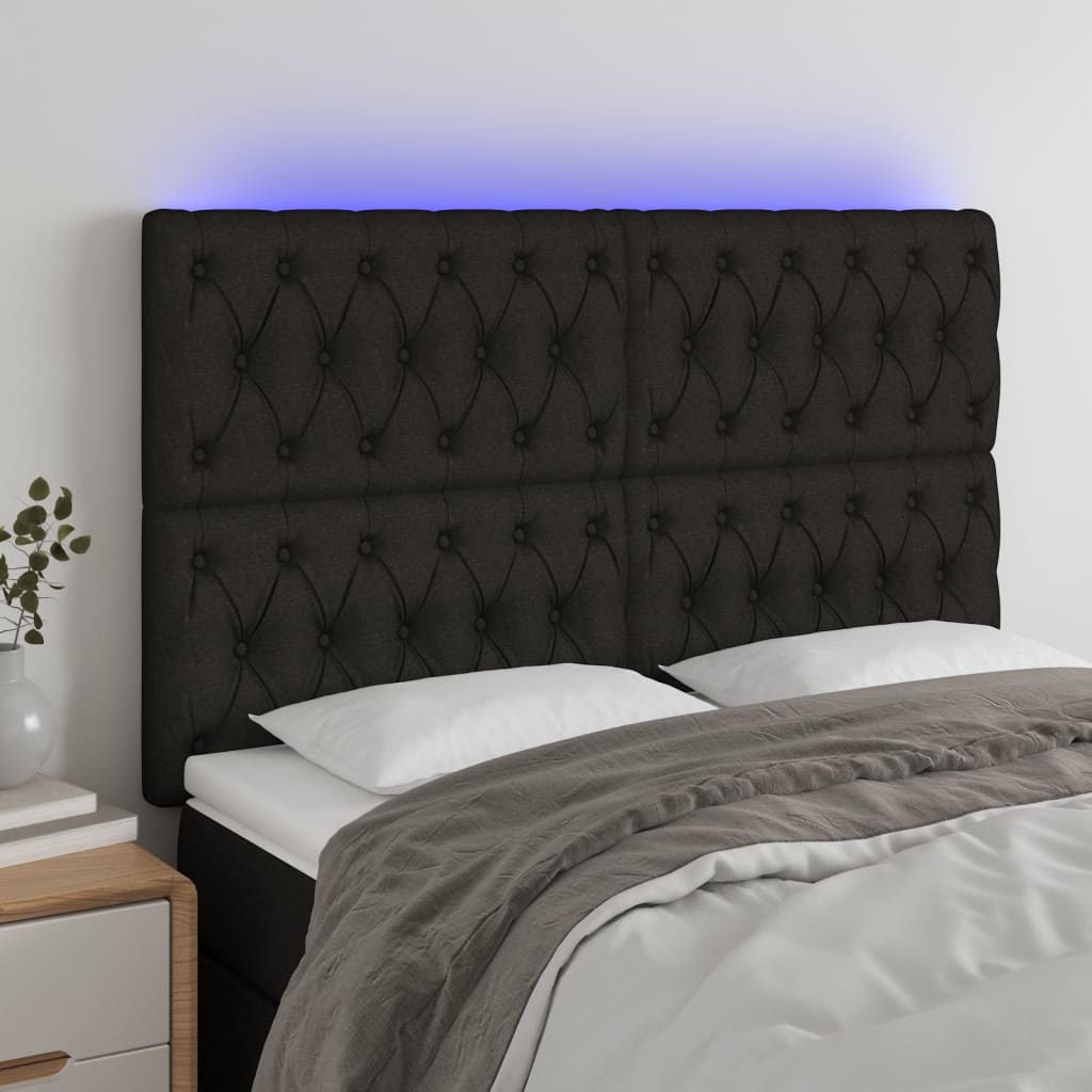 Čelo postele s LED černé 160x7x118/128 cm textil