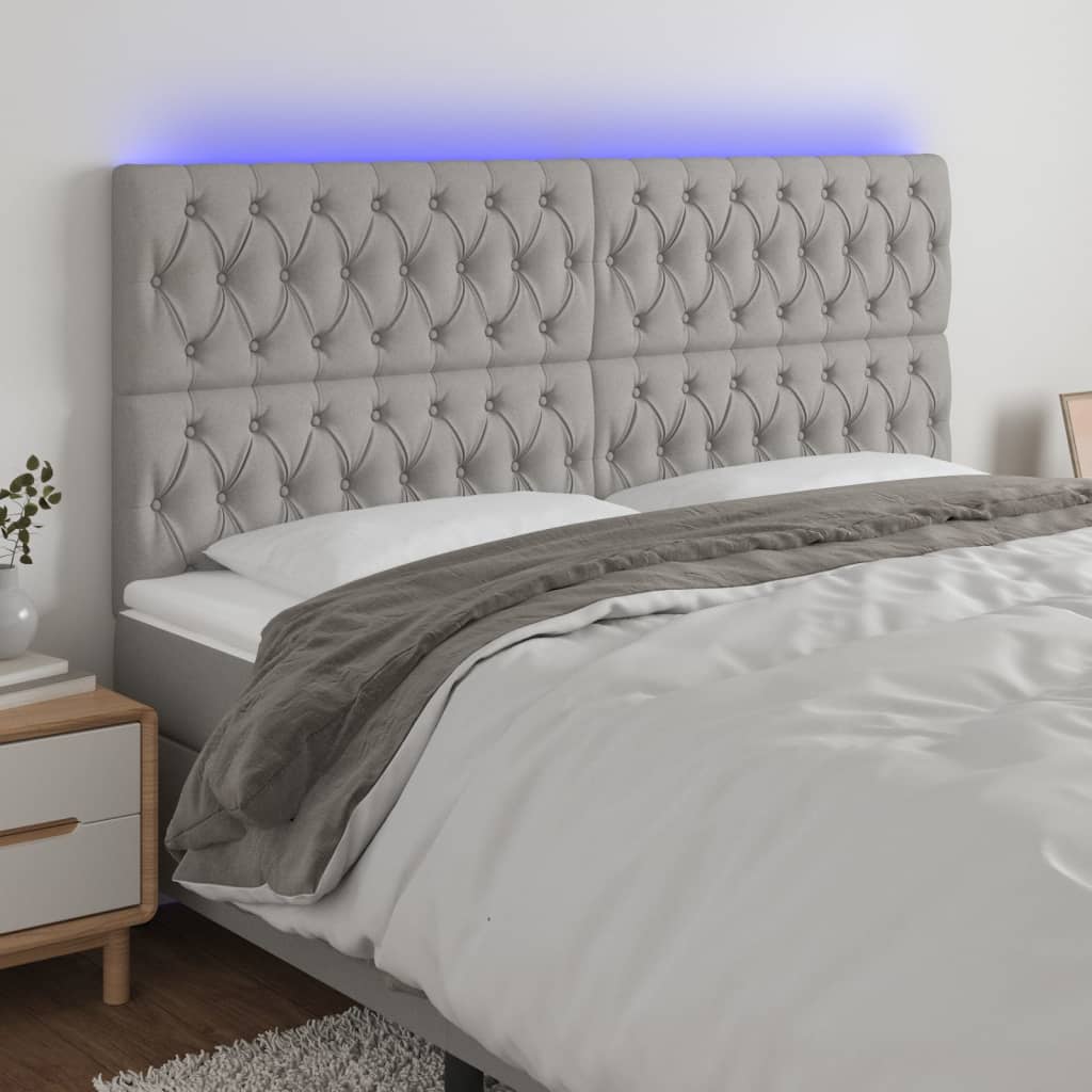 Čelo postele s LED světle šedé 180x7x118/128 cm textil