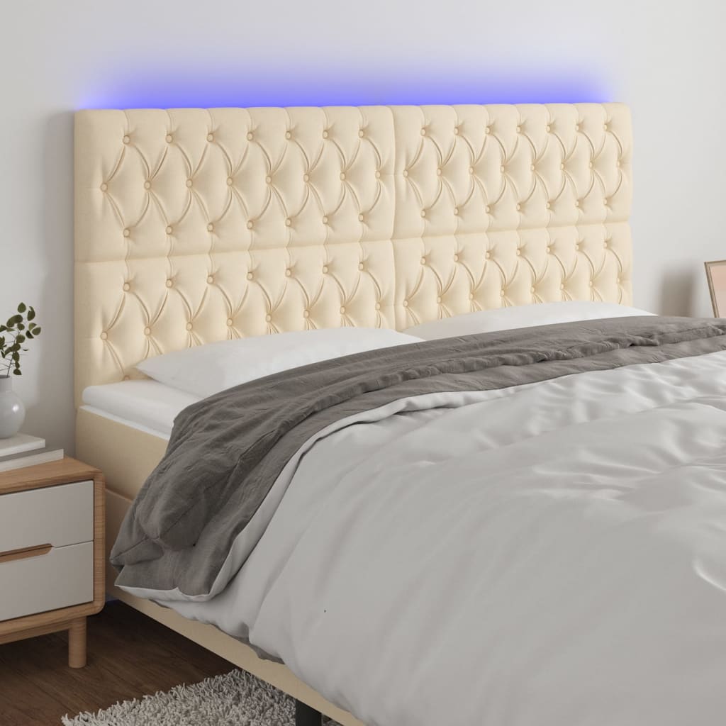 Čelo postele s LED krémové 200x7x118/128 cm textil