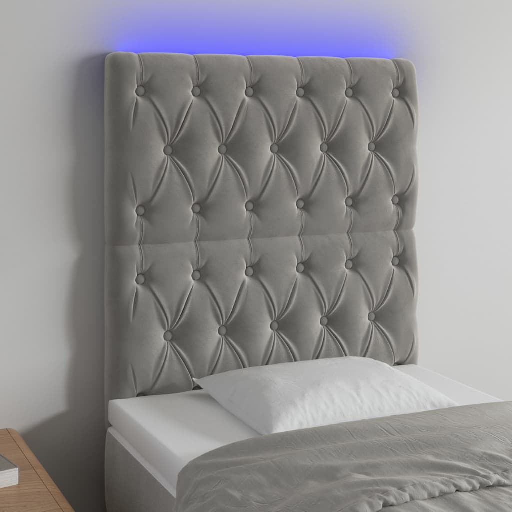 Čelo postele s LED světle šedé 80x7x118/128 cm samet
