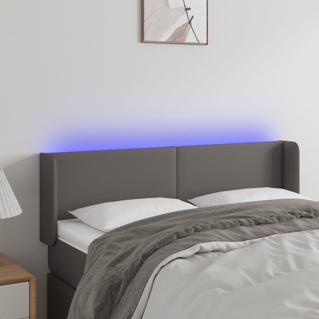 Čelo postele s LED šedé 147 x 16 x 78/88 cm umělá kůže