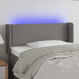 Čelo postele s LED tmavě šedé 83 x 16 x 78/88 cm textil - obrázek 1