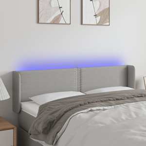 Čelo postele s LED světle šedé 147 x 16 x 78/88 cm textil - obrázek 1