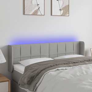 Čelo postele s LED světle šedé 147 x 16 x 78/88 cm textil - obrázek 1