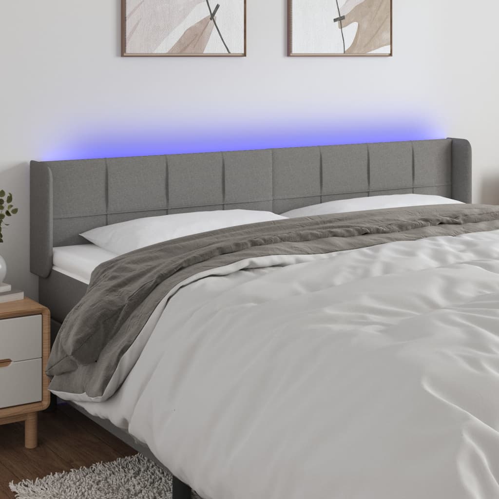 Čelo postele s LED tmavě šedé 203 x 16 x 78/88 cm textil