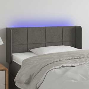 Čelo postele s LED tmavě šedé 93 x 16 x 78/88 cm samet