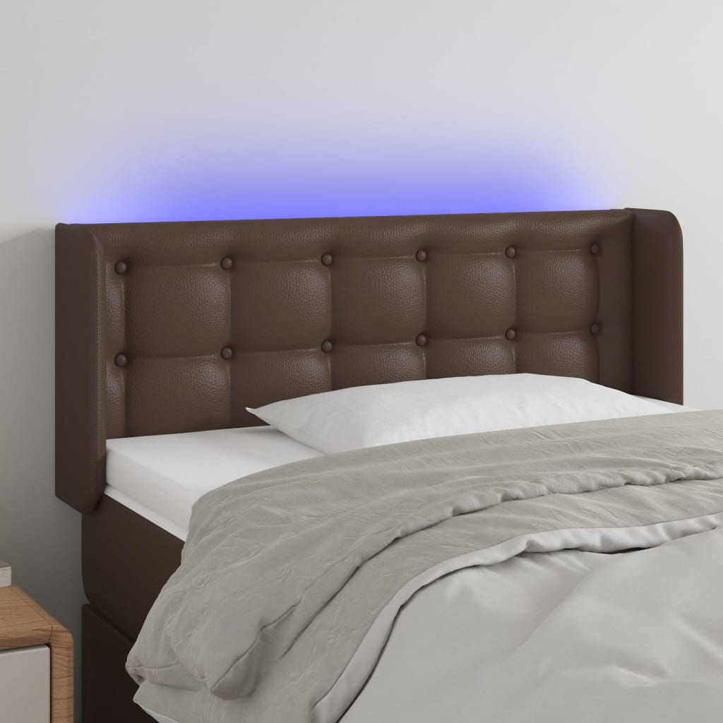 Čelo postele s LED hnědé 103 x 16 x 78/88 cm umělá kůže