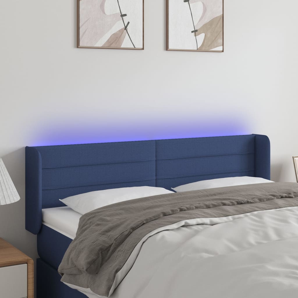 Čelo postele s LED modré 147 x 16 x 78/88 cm textil