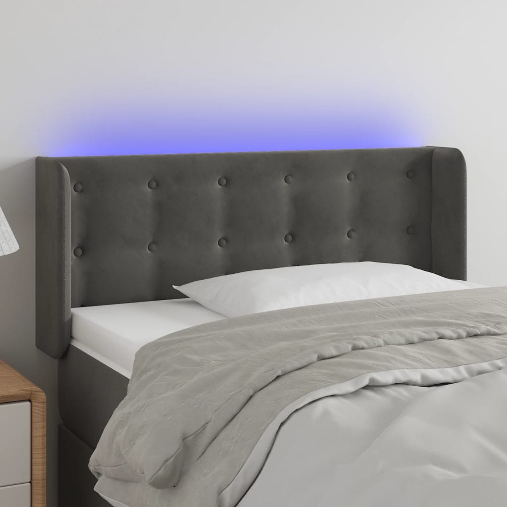 Čelo postele s LED tmavě šedé 93 x 16 x 78/88 cm samet