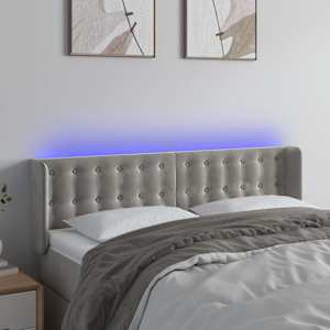 Čelo postele s LED světle šedé 147 x 16 x 78/88 cm samet - obrázek 1