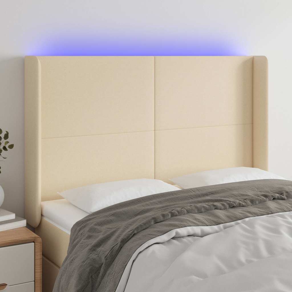 vidaXL sengegavl med LED-lys 147x16x118/128 cm stof cremefarvet
