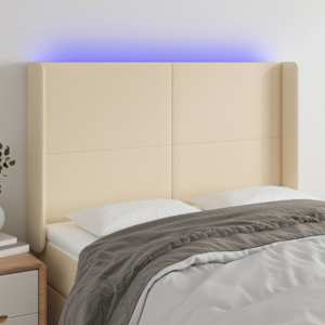 Čelo postele s LED krémové 147 x 16 x 118/128 cm textil - obrázek 1