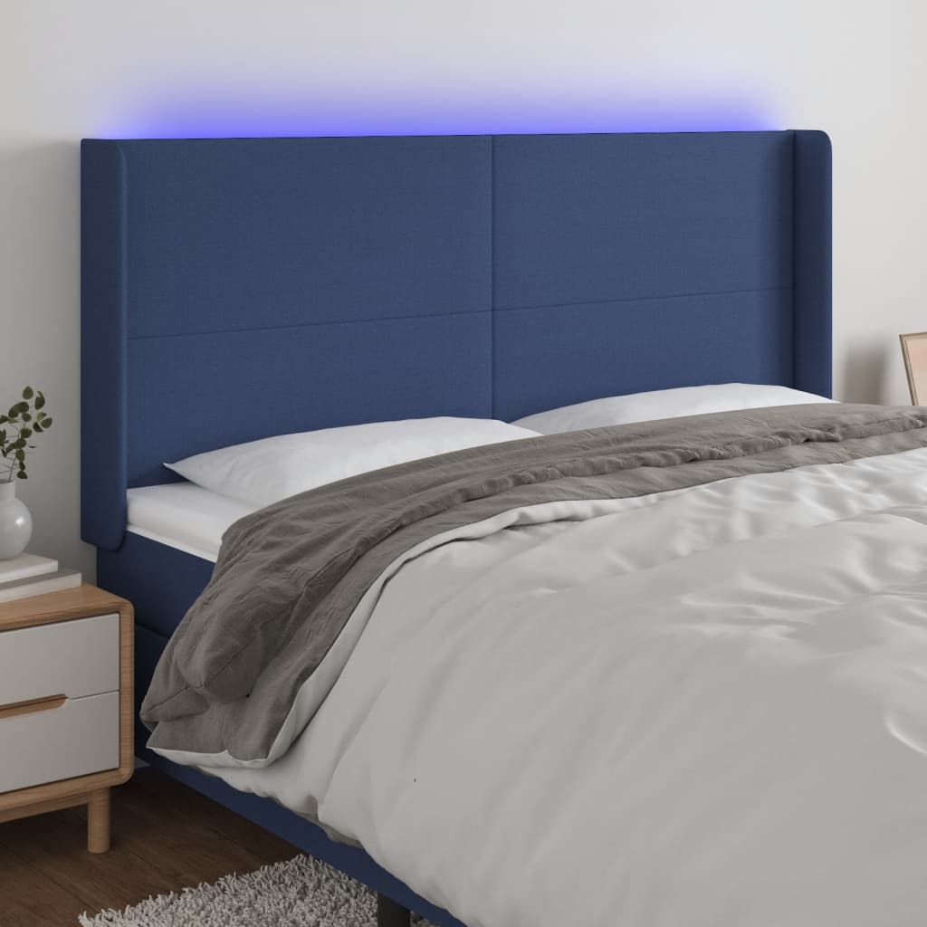 Čelo postele s LED modré 203 x 16 x 118/128 cm textil