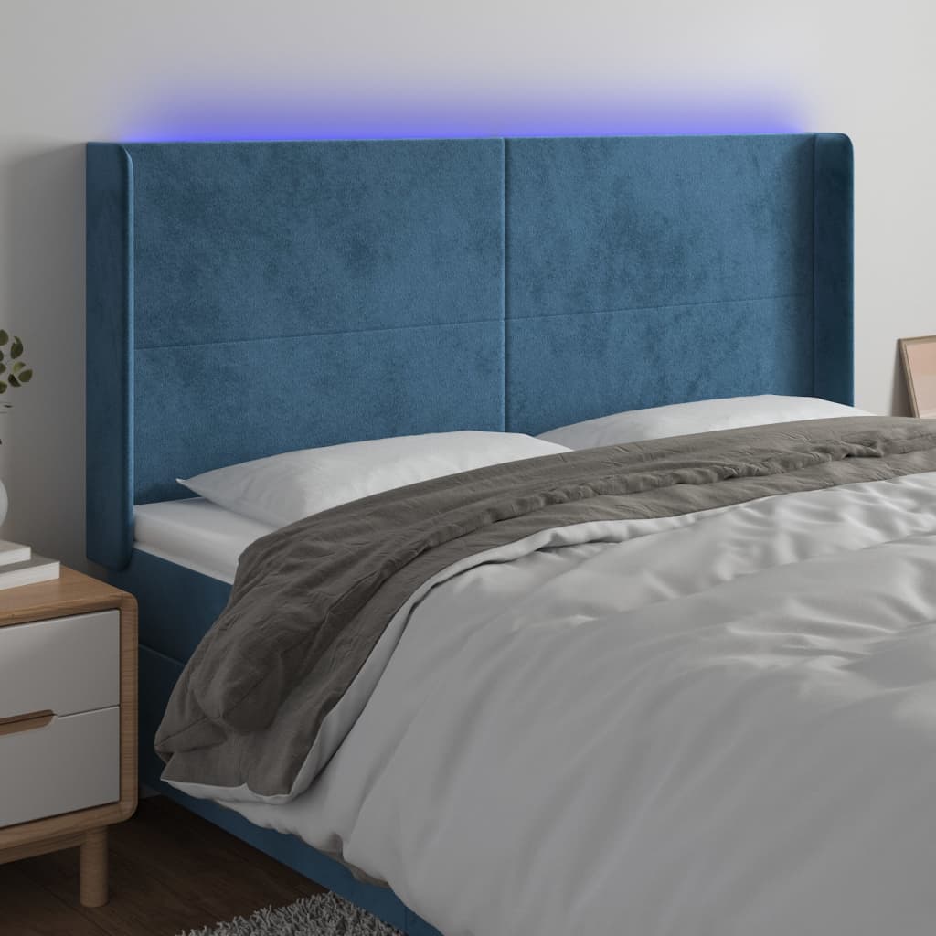 Čelo postele s LED tmavě modré 163 x 16 x 118/128 cm samet