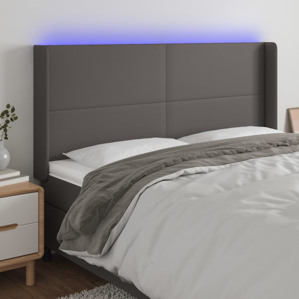 Čelo postele s LED šedé 183 x 16 x 118/128 cm umělá kůže