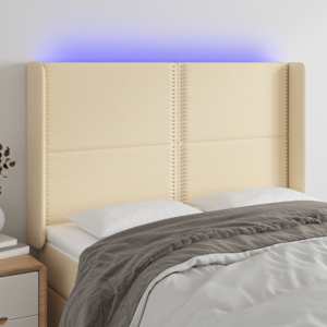 Čelo postele s LED krémové 147 x 16 x 118/128 cm textil - obrázek 1