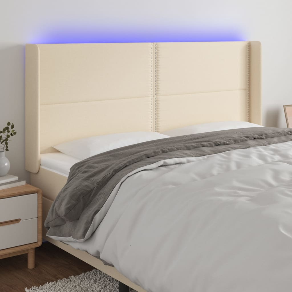 gultas galvgalis ar LED, 203x16x118/128 cm, krēmkrāsas audums | Stepinfit.lv