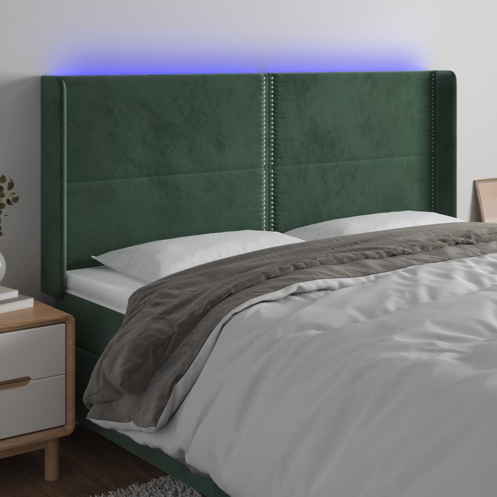 Čelo postele s LED tmavě zelené 163 x 16 x 118/128 cm samet