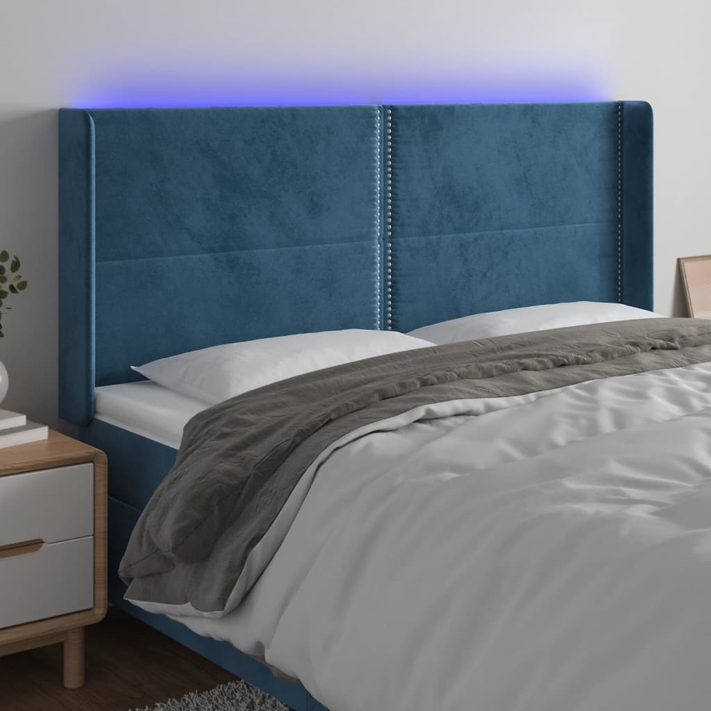 Čelo postele s LED tmavě modré 163 x 16 x 118/128 cm samet