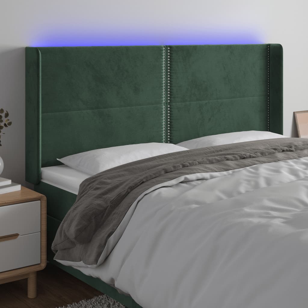 Čelo postele s LED tmavě zelené 183 x 16 x 118/128 cm samet
