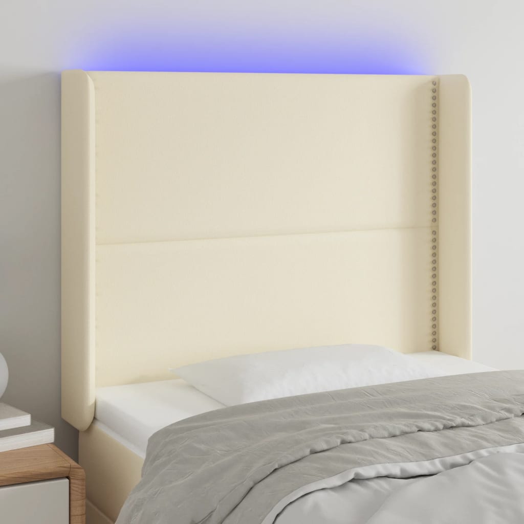 vidaXL sengegavl med LED-lys 83x16x118/128 cm kunstlæder cremefarvet