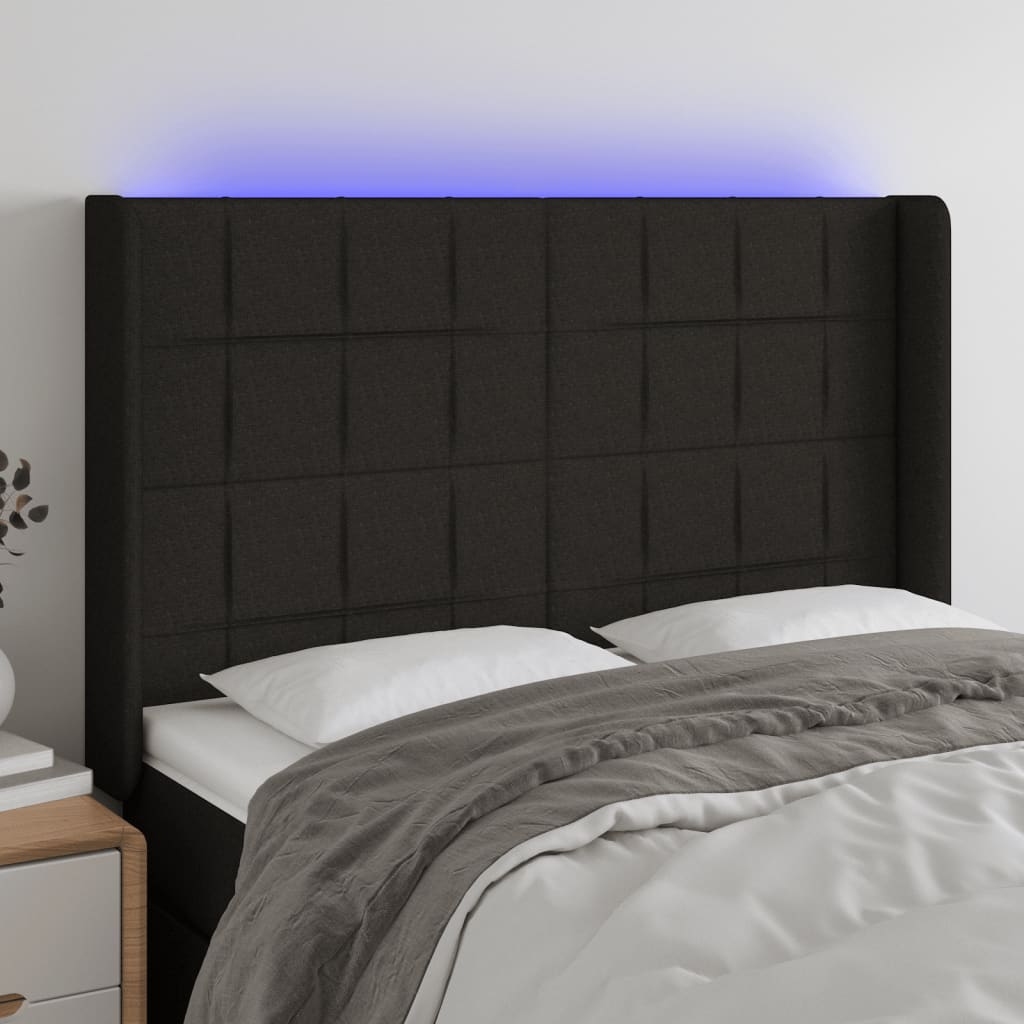 Čelo postele s LED černé 147 x 16 x 118/128 cm textil