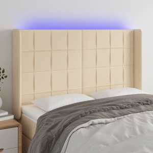 Čelo postele s LED krémové 147 x 16 x 118/128 cm textil - obrázek 1
