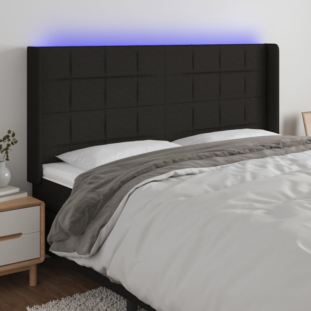 Čelo postele s LED černé 183 x 16 x 118/128 cm textil
